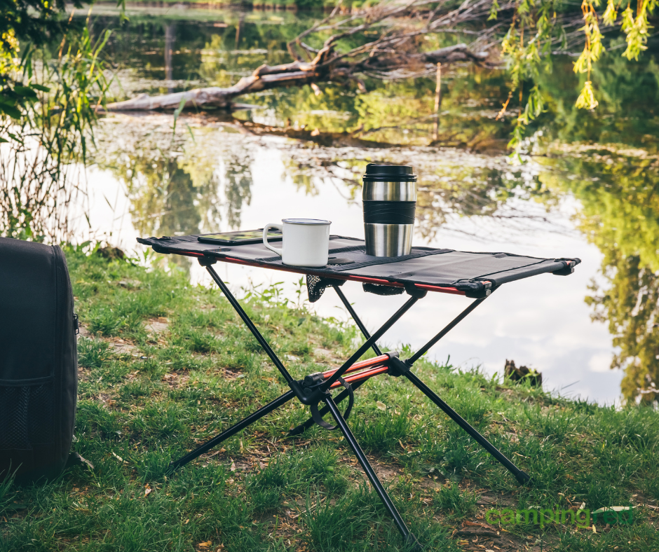 Mesa plegable altura regulable para camping con malla Aktive